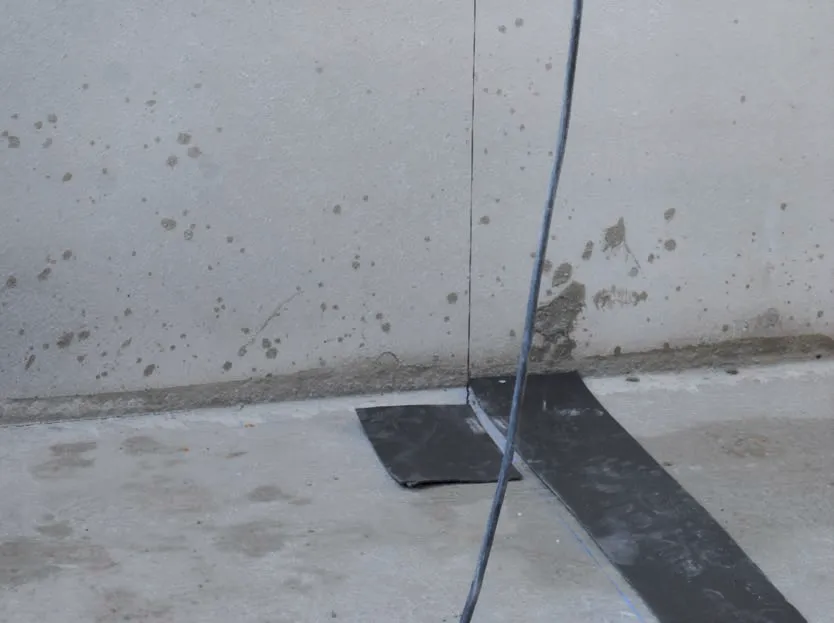 Damp-proof course laid on the slab before laying