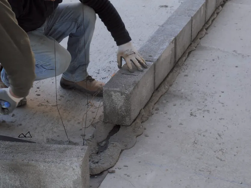 First course of SMARTBLOCK blocks laid on cement mortar